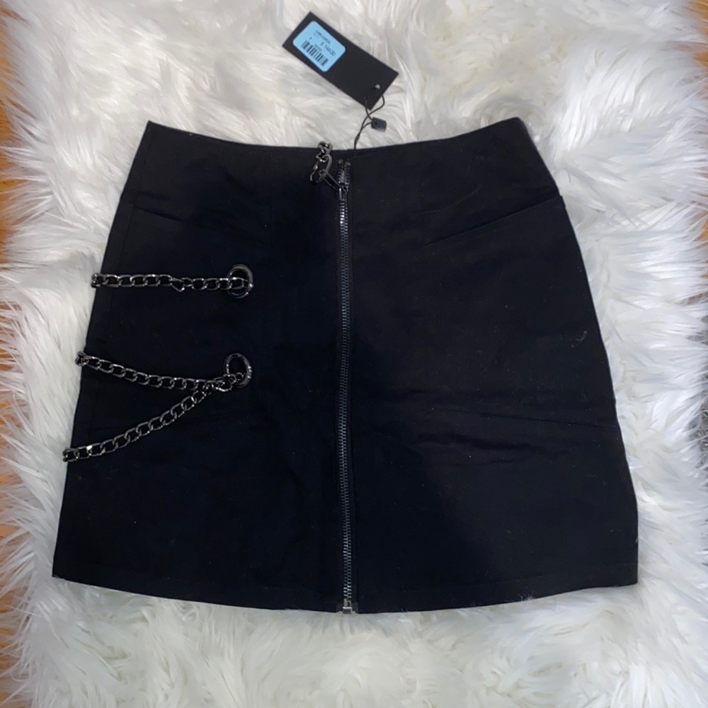 This adorable, never worn, black mini skirt from LF!